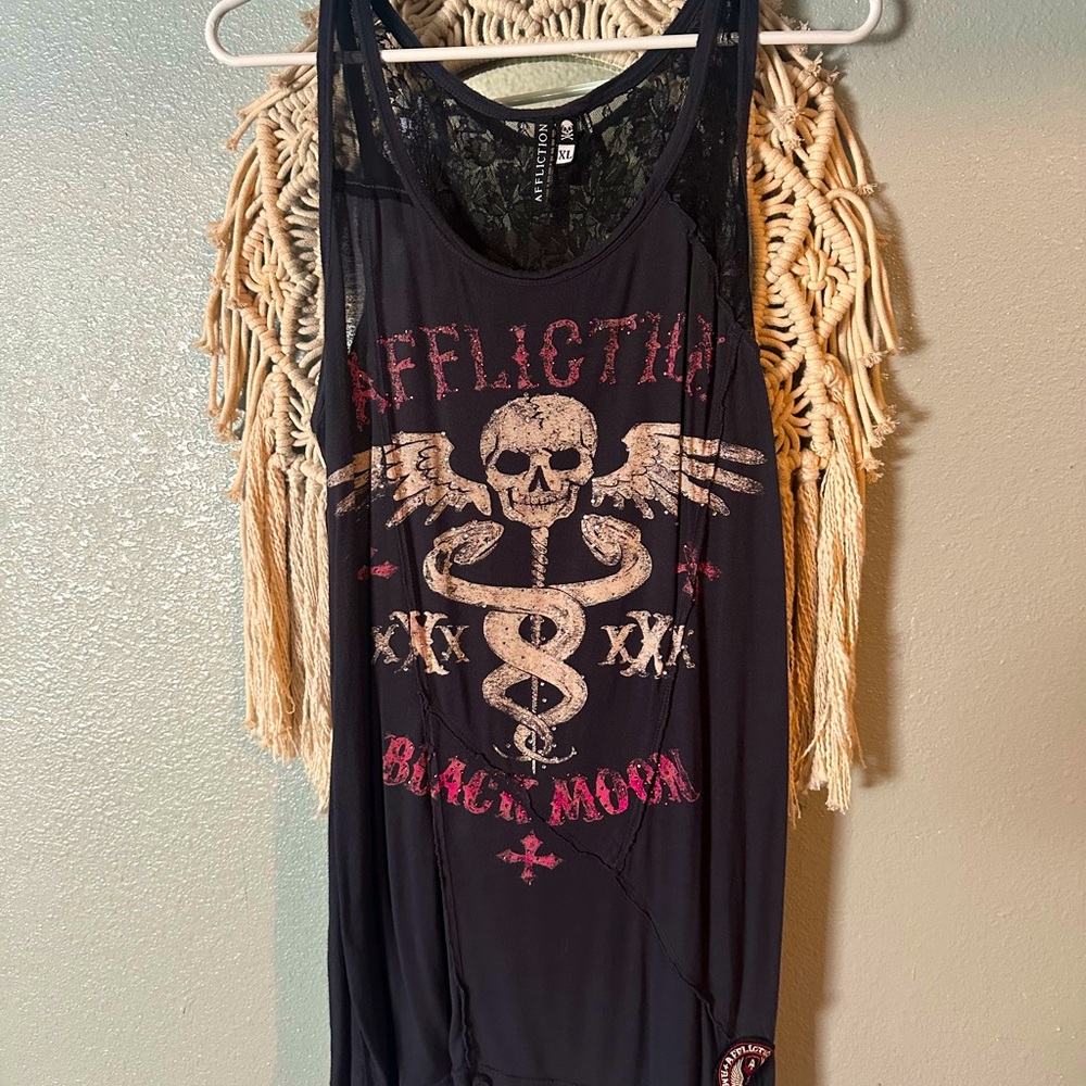 Affliction tank top with lace and braided back.